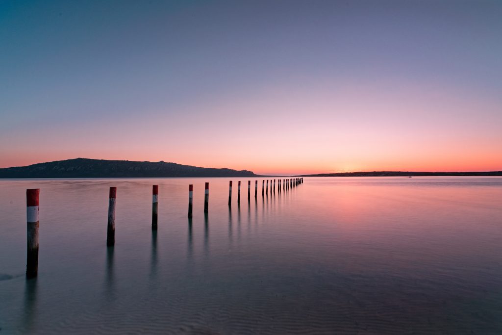 Langebaan Beach poles sunset PicFlick