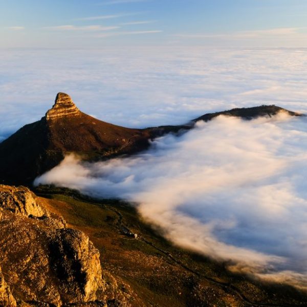 Lion's Head at sunrise with Cape Town under a blanket of Atlantic Fog